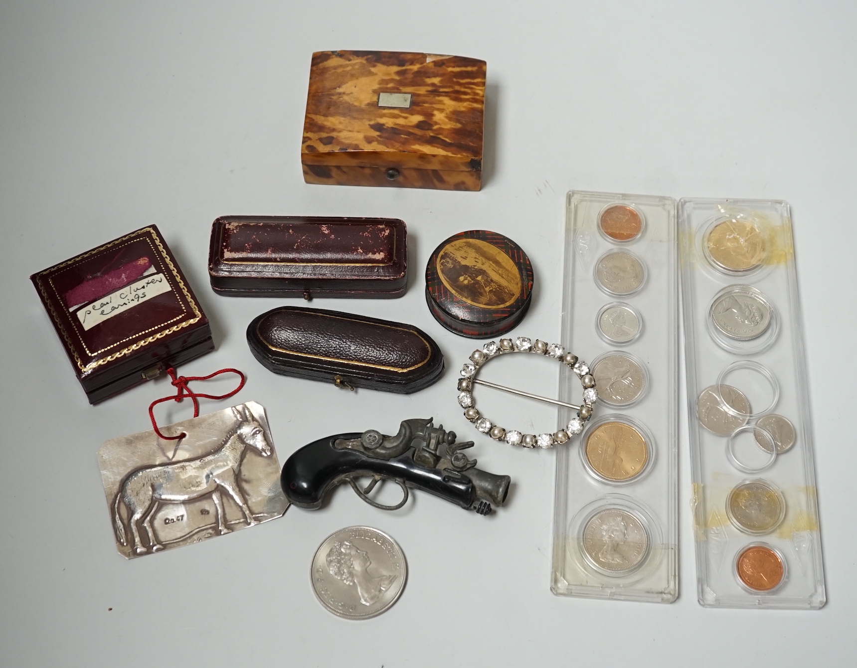 A quantity of collectors items including coins, a tortoiseshell veneered trinket box etc.